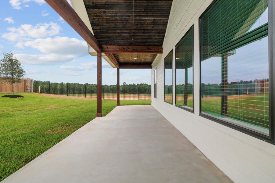 Exterior details and patio area of a home in , Magnolia (Image 3).