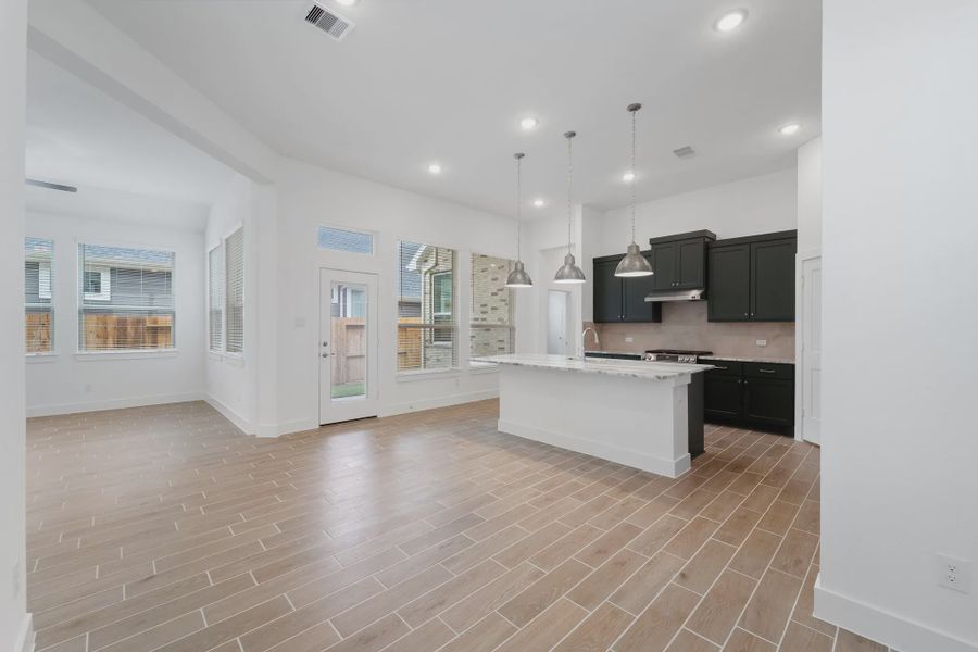 Image 42 representing the Augusta by Chesmar Homes in Riceland Alley Loads, Mont Belvieu, TX.