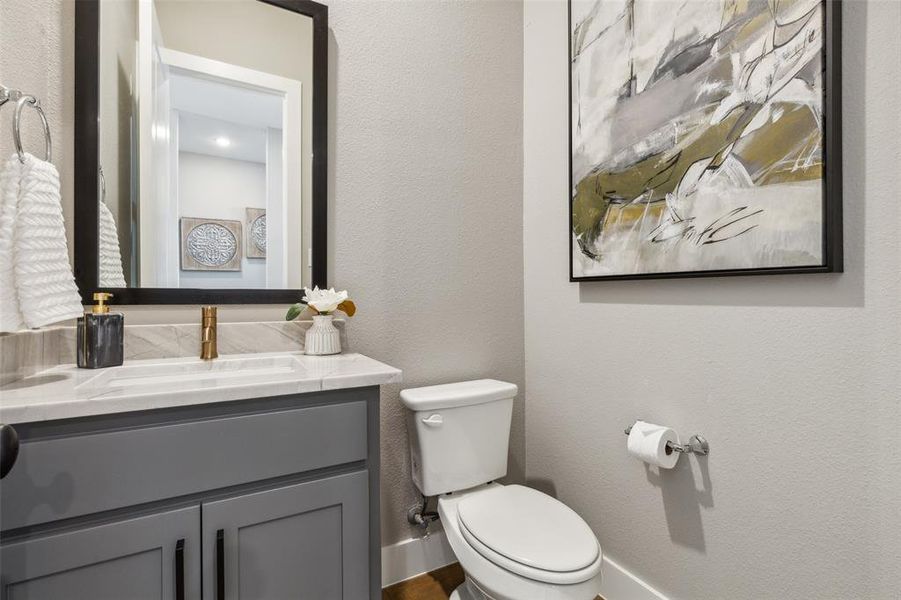 Bathroom with vanity and toilet