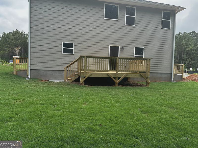 Front exterior of a new home in Canterbury Villas, Carrollton, GA, highlighting curb appeal (Image 14).