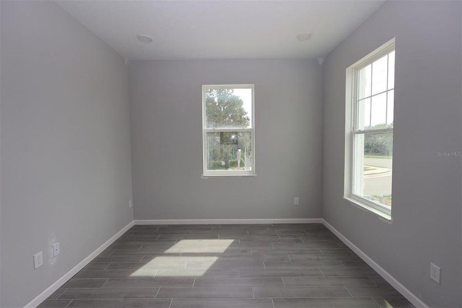 Spacious, unfurnished interior of a new home in Tribute at Ovation, Winter Garden (Image 19).