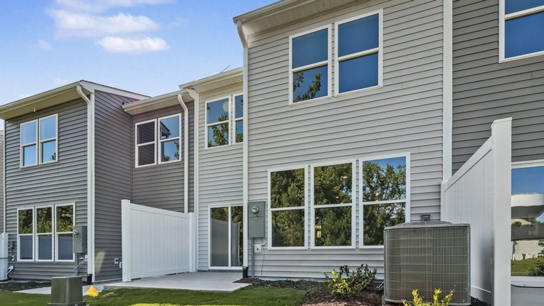Exterior details and patio area of a home in Chapel Townes, Raleigh (Image 30).