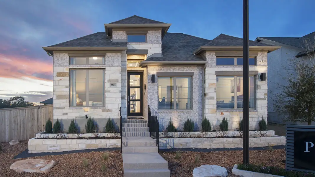 Front exterior of a new home in Escondido, Magnolia, TX, highlighting curb appeal (Image 20).
