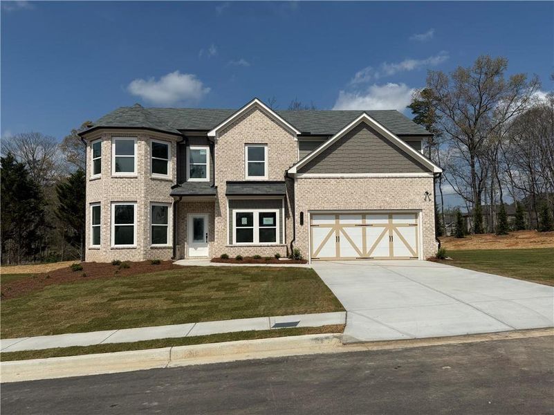 Front exterior of a new home in , Hoschton, GA, highlighting curb appeal (Image 2). Front exterior of a new home in , Hoschton, GA, highlighting curb appeal (Image 2).