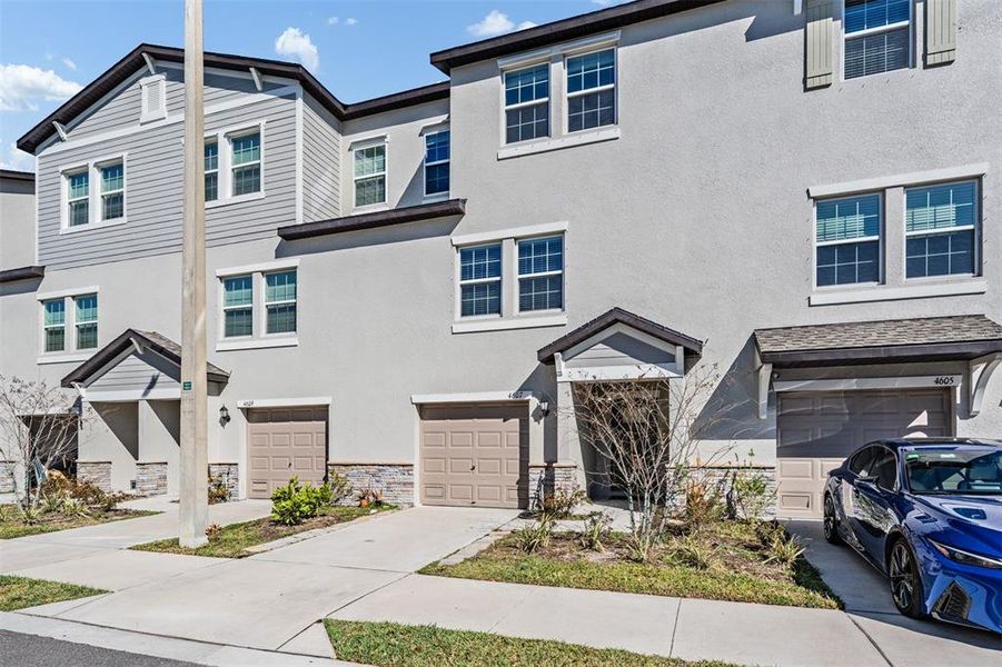 Front exterior of a new home in , Tampa, FL, highlighting curb appeal (Image 31).