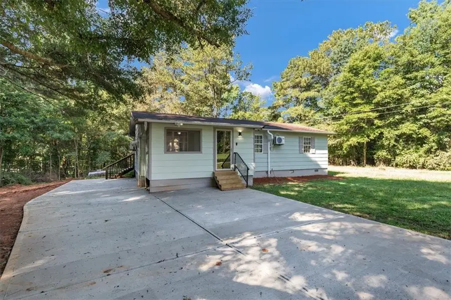 Exterior details and patio area of a home in , McDonough (Image 3).