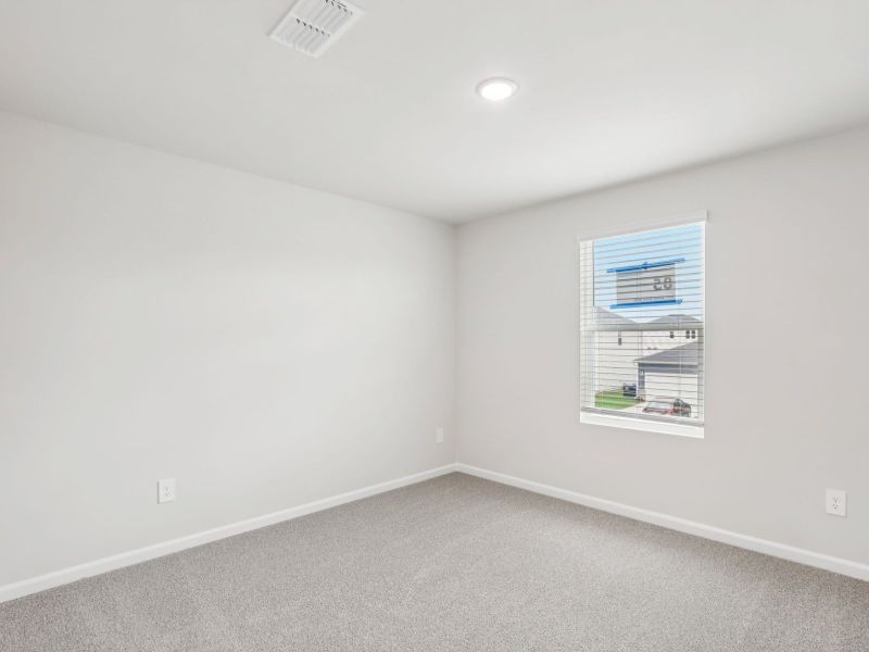 Spacious, unfurnished interior of a new home in River Glen, Angier (Image 16).