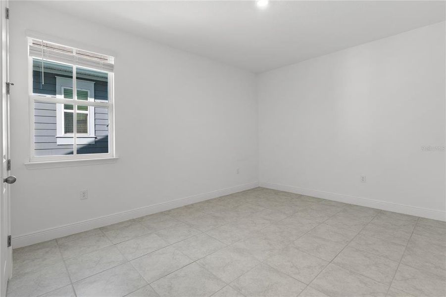 Spacious, unfurnished interior of a new home in Summerdale Park at Lake Nona, Orlando (Image 22).