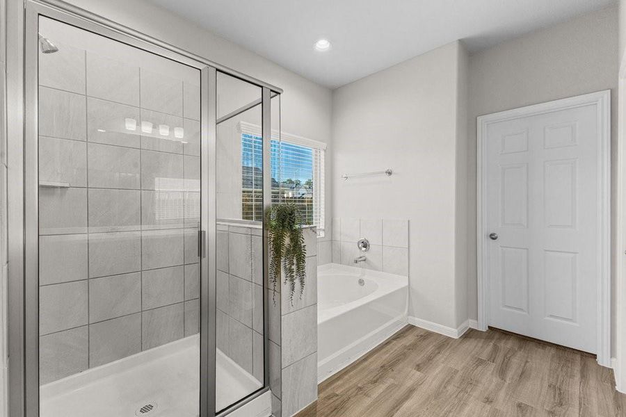 Furnished interior view inside a new home in Mill Creek Trails, Magnolia (Image 9).