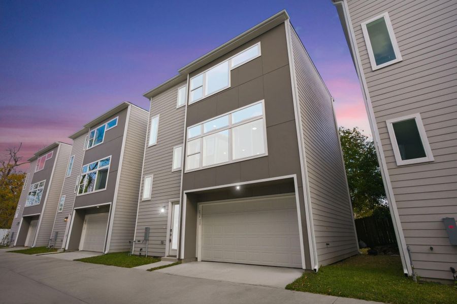 Front exterior of a new home in , Houston, TX, highlighting curb appeal (Image 28).