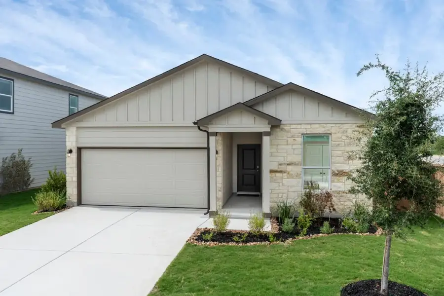 Representative exterior photo of a completed home built from the 1889 by KB Home in Espino Trails, San Antonio, TX (Image 15).