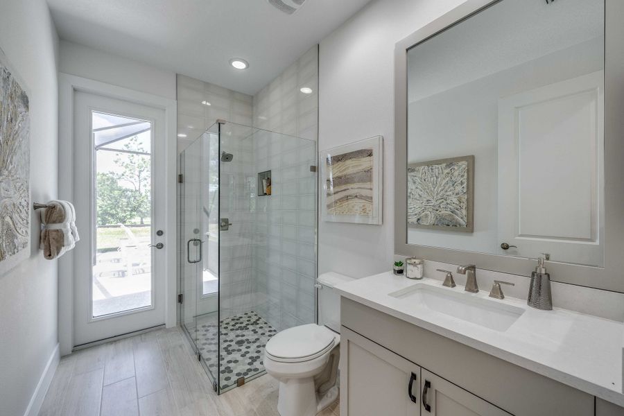 Furnished interior in a model home at Bent Pine Preserve in Vero Beach (Image 20).