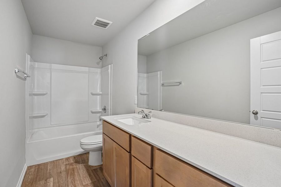 Furnished interior view inside a new home in Hunters Ranch, San Antonio (Image 12).