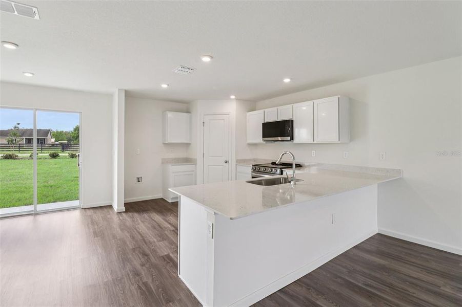 Furnished interior view inside a new home in Sumter Villas, Sumterville (Image 7).