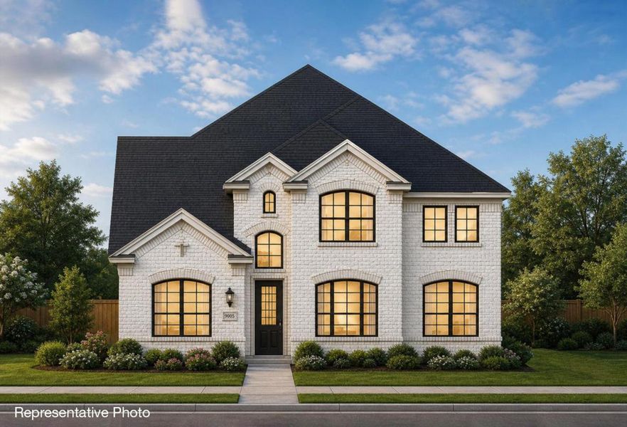 Representative exterior photo of a completed home built from the Royal Martinique by Grand Homes in Edgewater, Fate, TX (Image 17).