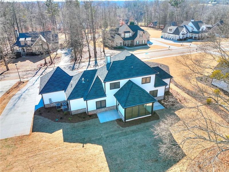 Front exterior of a new home in , Commerce, GA, highlighting curb appeal (Image 24).