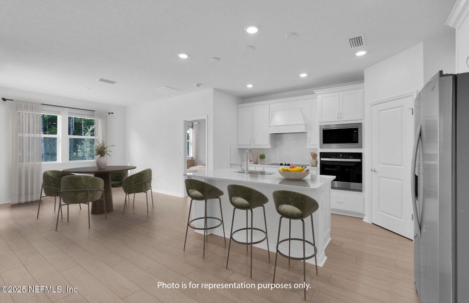 Furnished interior view inside a new home in Hyland Trail, Green Cove Springs (Image 3).