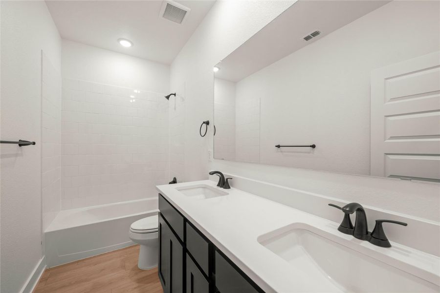Furnished interior view inside a new home in Rancho San Gabriel, Georgetown (Image 9).