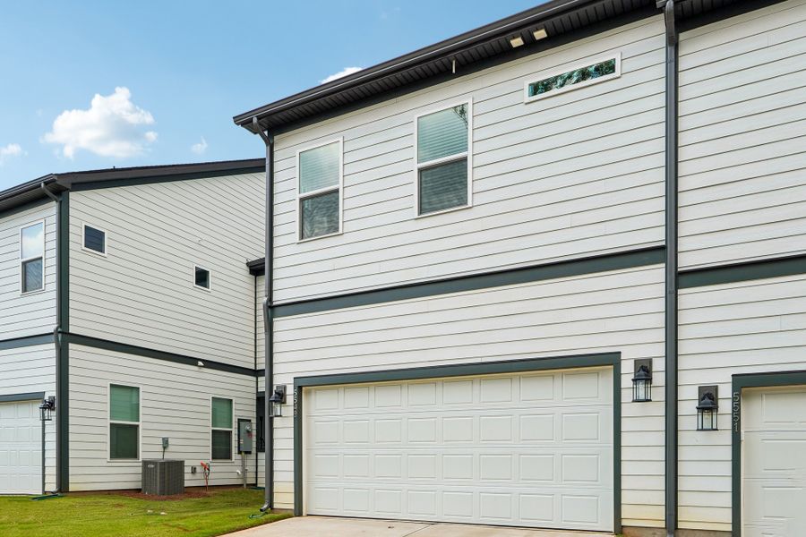 Exterior details and patio area of a home in Terraces at the Exchange, Indian Land (Image 21).