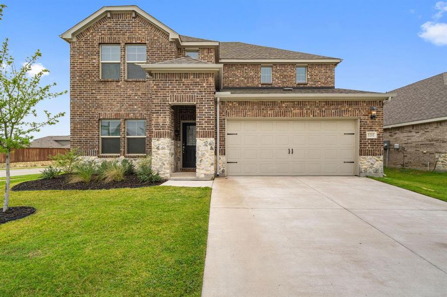 Front exterior of a new home in Northstar, Haslet, TX, highlighting curb appeal (Image 21).