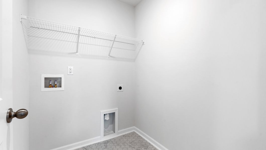 Representative furnished interior of a home built from the BELHAVEN by D.R. Horton in Benjamin's Grove, Woodruff (Image 16).