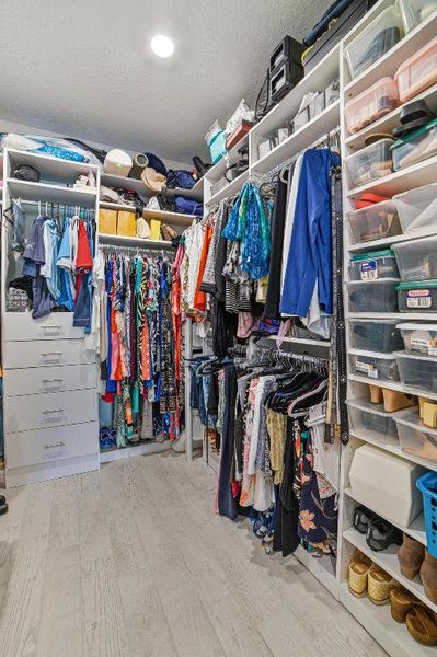 Primary Walk-in Closet Primary Walk-in Closet