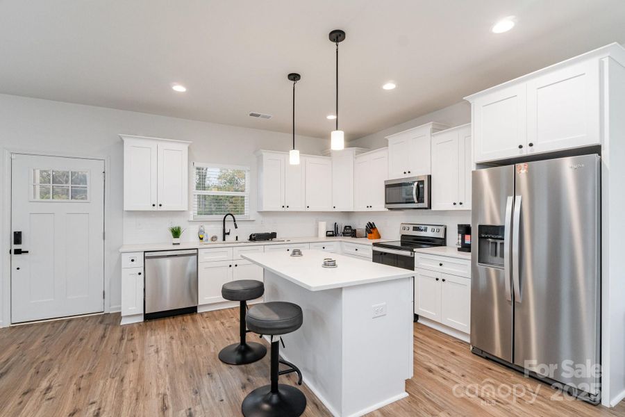 Furnished interior view inside a new home in , Charlotte (Image 5). Furnished interior view inside a new home in , Charlotte (Image 5).