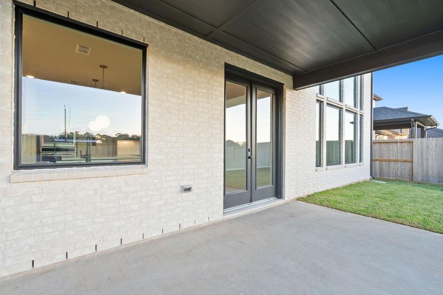 Exterior details and patio area of a home in Sienna 45', 50', Missouri City (Image 3). Exterior details and patio area of a home in Sienna 45', 50', Missouri City (Image 3).