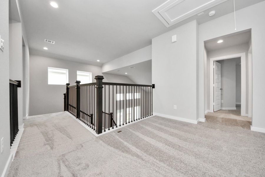 Ascend to relaxation in this fantastic game room! Ideal for both casual gatherings and adult gaming, it boasts plush carpet, lofty ceilings, custom paint, and ample windows for abundant natural light. Ascend to relaxation in this fantastic game room! Ideal for both casual gatherings and adult gaming, it boasts plush carpet, lofty ceilings, custom paint, and ample windows for abundant natural light.