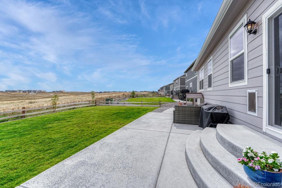 Exterior details and patio area of a home in Spring Valley Ranch, Elizabeth (Image 26).
