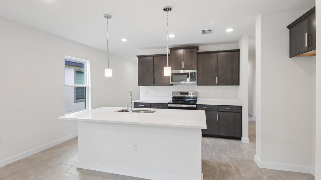 Furnished interior view inside a new home in Grasslands West, Lakeland (Image 13).