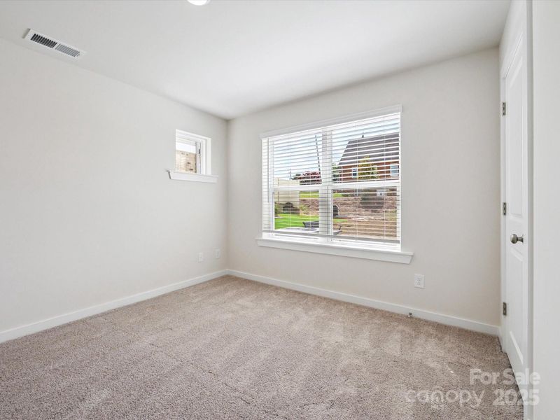 Spacious, unfurnished interior of a new home in Central Living at Craig, Charlotte (Image 30).