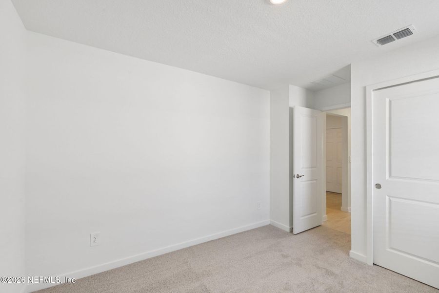 Spacious, unfurnished interior of a new home in Colbert Landings, Palm Coast (Image 34). Spacious, unfurnished interior of a new home in Colbert Landings, Palm Coast (Image 34).