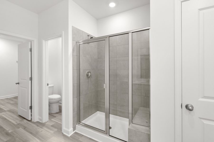 Furnished interior view inside a new home in Waterside - Boardwalk Series, Longs (Image 6).