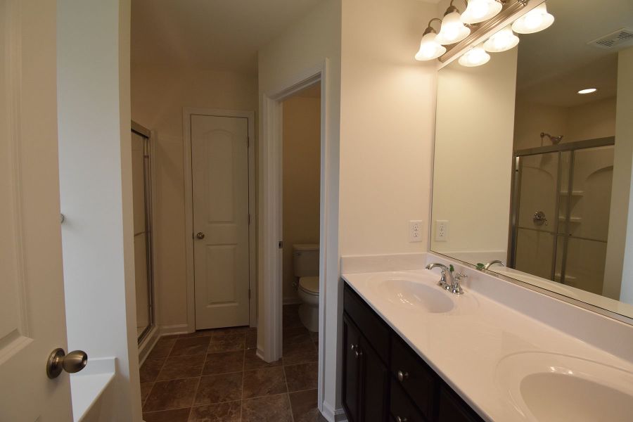 Representative furnished interior of a home built from the Irvine by Keystone Homes NC in The Wilcox, Greensboro (Image 19).