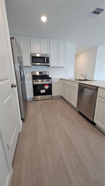 Furnished interior view inside a new home in Anniston: Watermill Collection, Katy (Image 3).