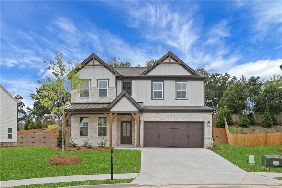 Front exterior of a new home in The Paddocks at Doc Hughes, Buford, GA, highlighting curb appeal (Image 26).