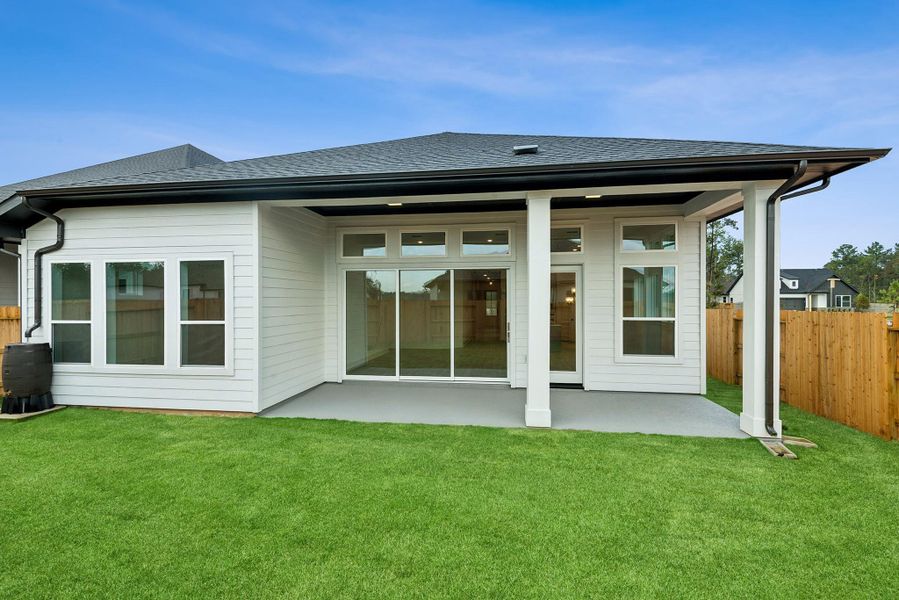 Exterior details and patio area of a home in ARTAVIA 50' Homesites, Conroe (Image 26).