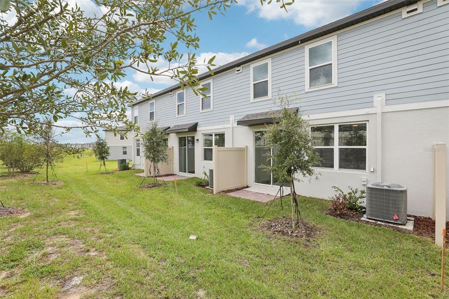 Exterior details and patio area of a home in Cagan Crossings West, Clermont (Image 23).