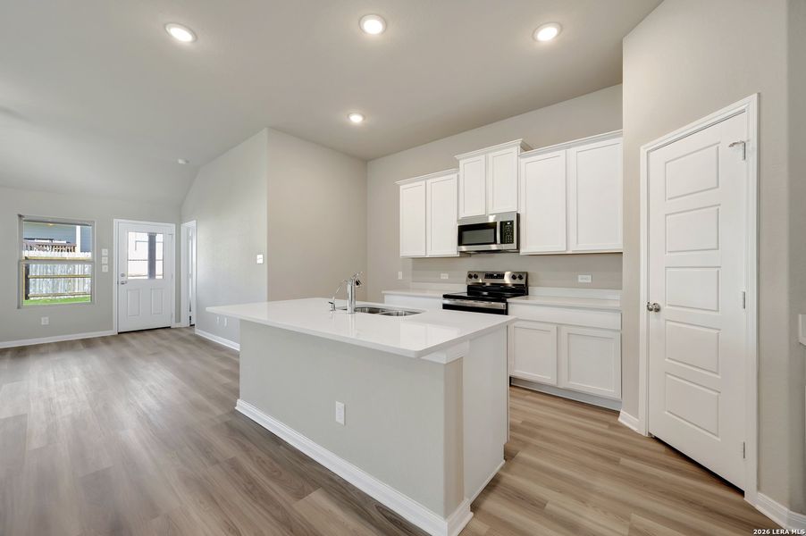 Furnished interior view inside a new home in Greenspoint Heights, Seguin (Image 6).