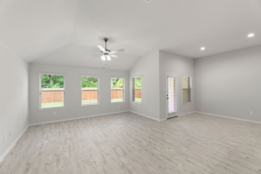 Representative exterior photo of a completed home built from the Boston by Impression Homes in Keeneland, Aubrey, TX (Image 11).