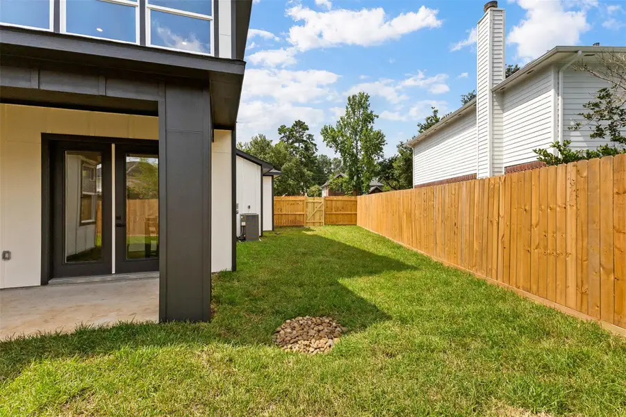 Exterior details and patio area of a home in , Spring (Image 3).