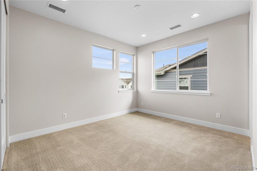 Spacious, unfurnished interior of a new home in Luxe at The Canyons, Castle Pines (Image 43).