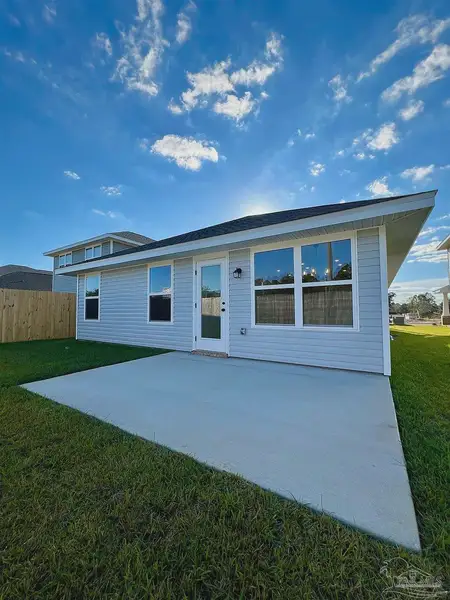 Exterior details and patio area of a home in Allison Acres, Cantonment (Image 3).