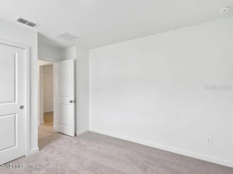 Spacious, unfurnished interior of a new home in Colbert Landings, Palm Coast (Image 12). Spacious, unfurnished interior of a new home in Colbert Landings, Palm Coast (Image 12).