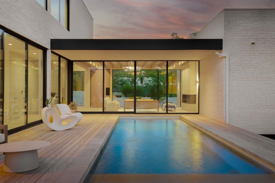 View of pool at dusk