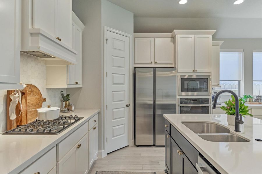 Plenty of storage in the spacious walk-in pantry.