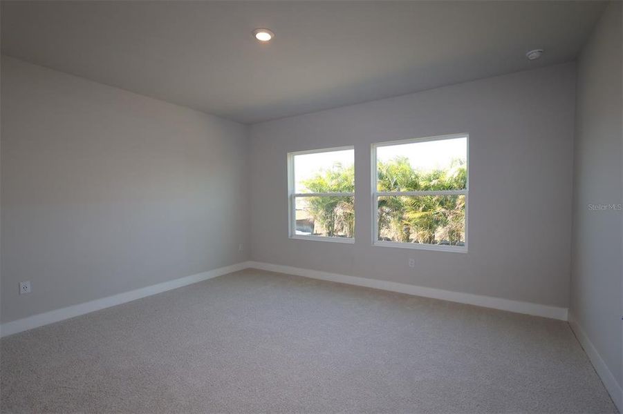 Spacious, unfurnished interior of a new home in Waterset Tradition Series, Apollo Beach (Image 13).