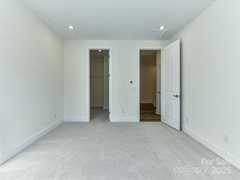 8' Doorways and 9' Ceilings at Primary Suite.