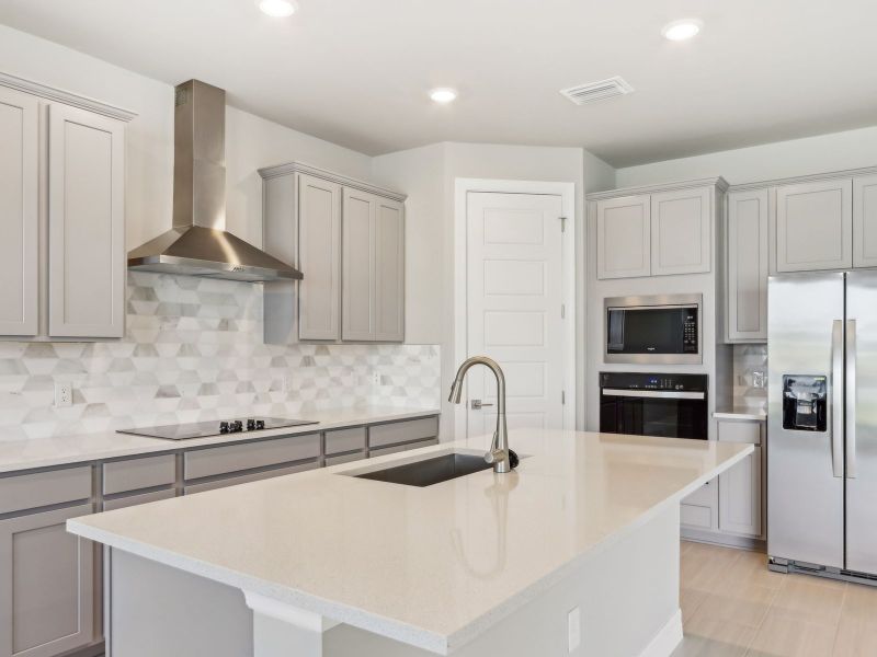 Kitchen in the Willet floorplan at 44326 Frontier Dr
